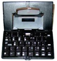 HP-Compaq iPAQ foldable keyboard partially opened